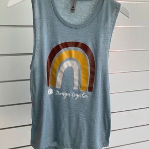 pure barre stronger together tank in light blue with rainbow